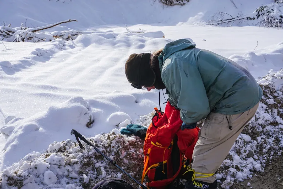 backpackers with hiking gear on a mountain trail in the dry season