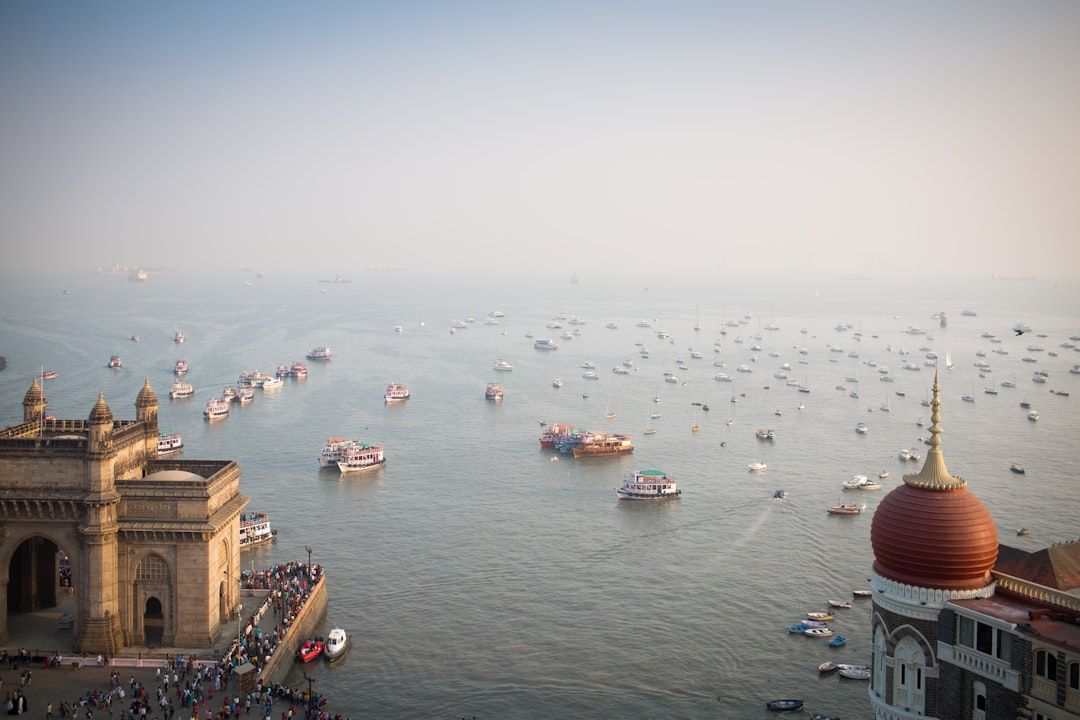 Seasonal Travel in Mumbai, India: Gateway of India at Sunset in Mumbai, India: Gateway of India at Sunset